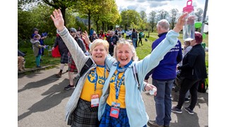 Three supporters walking